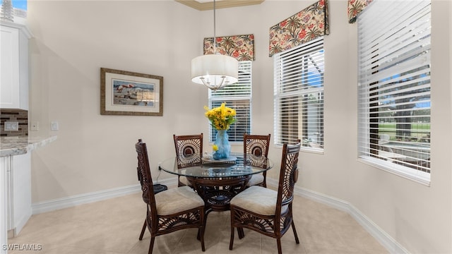 tiled dining space with ornamental molding