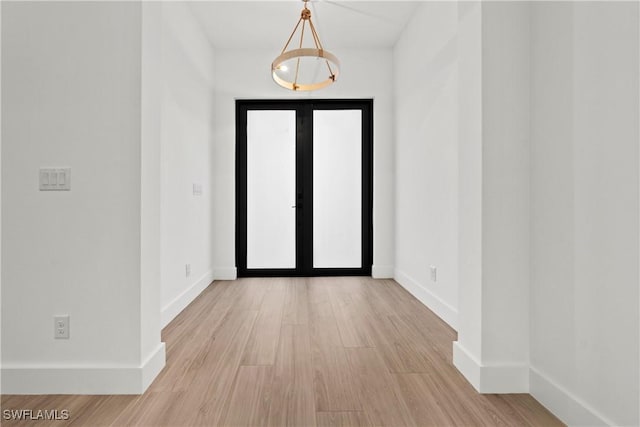 entryway with light hardwood / wood-style flooring