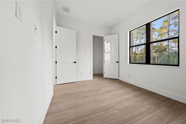 unfurnished bedroom featuring light hardwood / wood-style floors