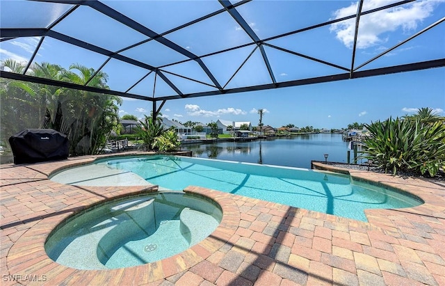 view of swimming pool with glass enclosure, a water view, an in ground hot tub, area for grilling, and a patio