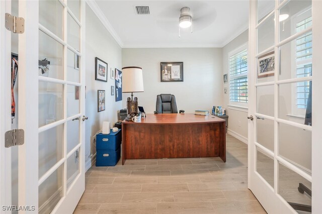 office area with ceiling fan, french doors, light hardwood / wood-style floors, and ornamental molding