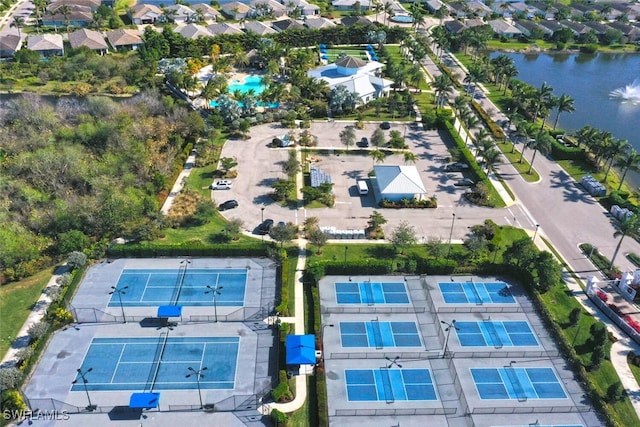 birds eye view of property featuring a water view