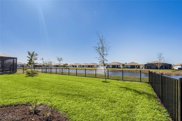 view of yard featuring a water view