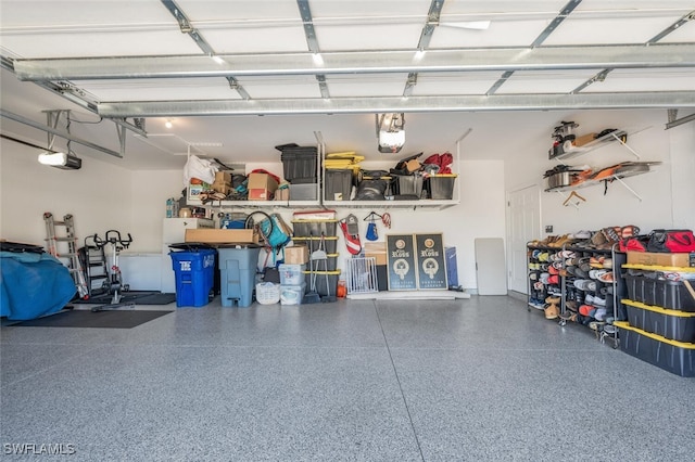 garage featuring a garage door opener