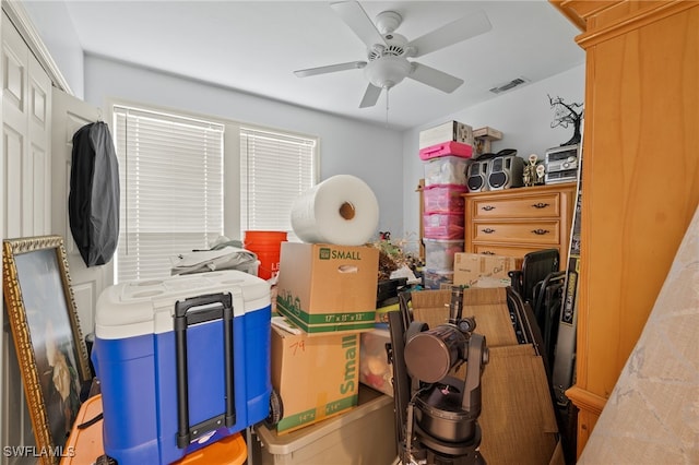 storage room with ceiling fan