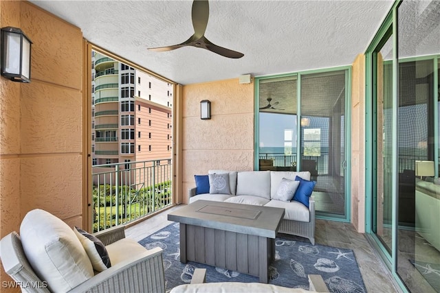 balcony featuring ceiling fan