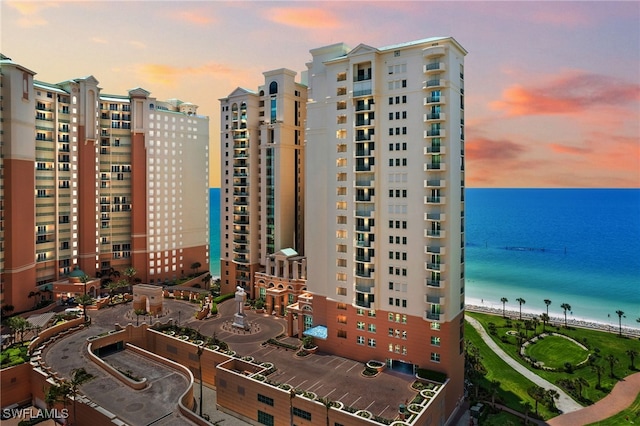 outdoor building at dusk with a water view