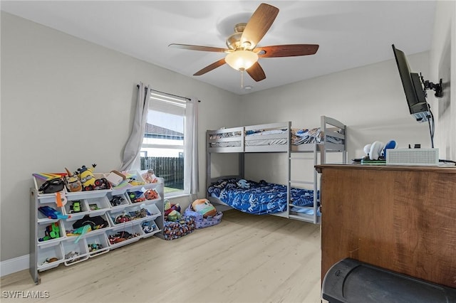 bedroom featuring ceiling fan and light hardwood / wood-style floors