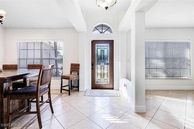 entryway featuring light tile patterned floors