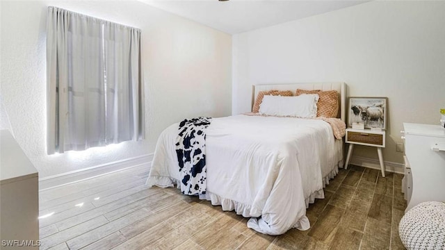 bedroom featuring hardwood / wood-style flooring