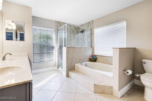 full bathroom featuring tile patterned floors, vanity, toilet, and shower with separate bathtub