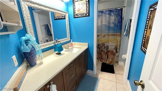 bathroom featuring a shower with curtain, tile patterned floors, and vanity