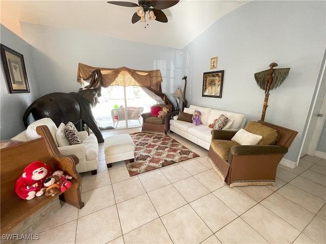 living room with lofted ceiling, light tile patterned floors, and ceiling fan