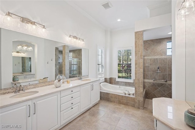 bathroom featuring vanity, crown molding, tile patterned flooring, and plus walk in shower