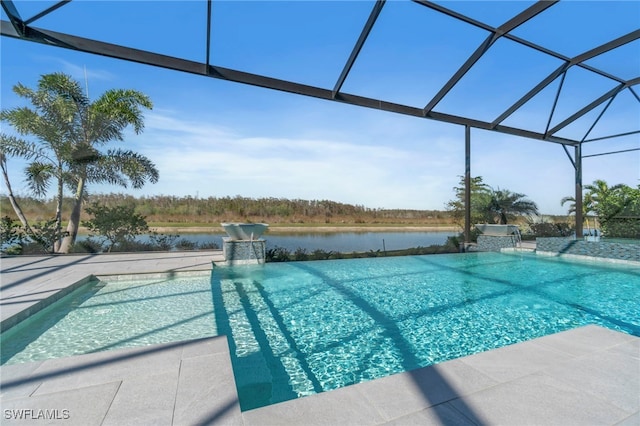 view of pool with glass enclosure and a water view