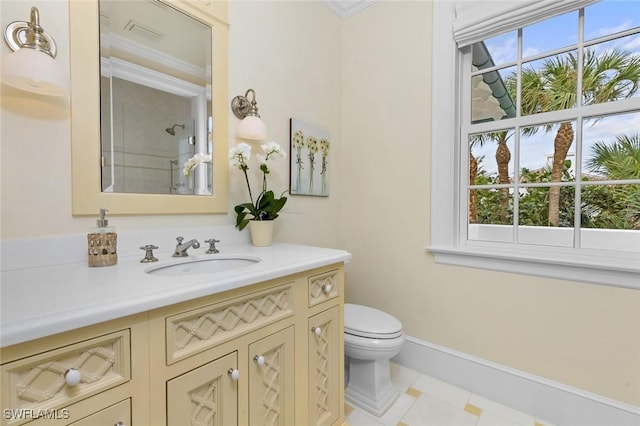 bathroom with a shower, toilet, and vanity