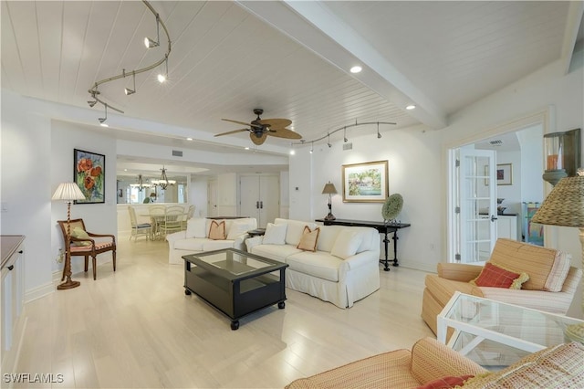 living room with rail lighting, light hardwood / wood-style flooring, ceiling fan, beam ceiling, and wood ceiling