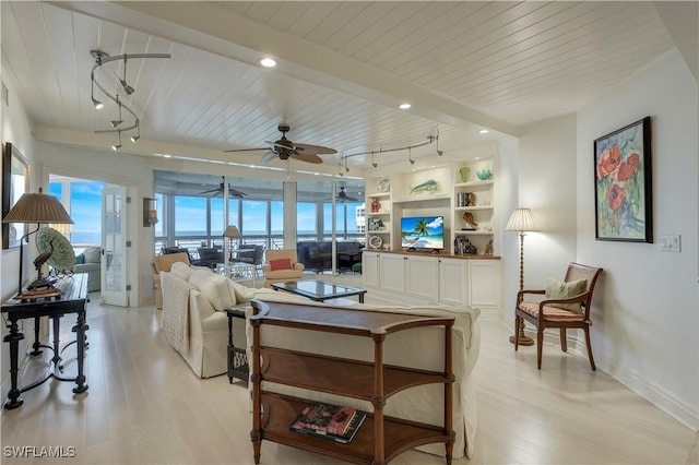 living room with beamed ceiling, light wood-type flooring, ceiling fan, and wood ceiling