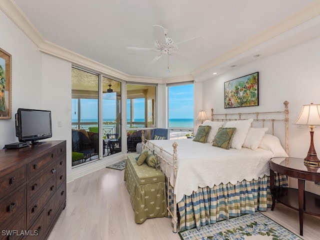 bedroom with access to outside, a water view, ceiling fan, light wood-type flooring, and ornamental molding