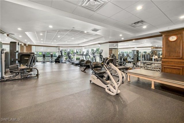 gym featuring a paneled ceiling