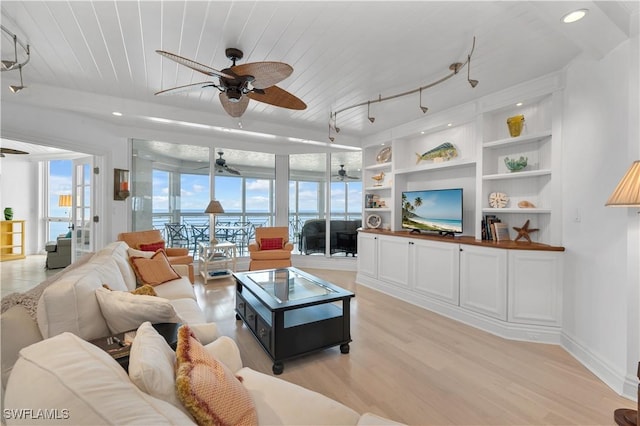 living room with light wood-type flooring, ceiling fan, and wooden ceiling