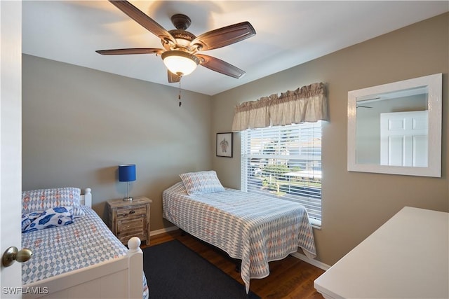 bedroom featuring hardwood / wood-style floors and ceiling fan