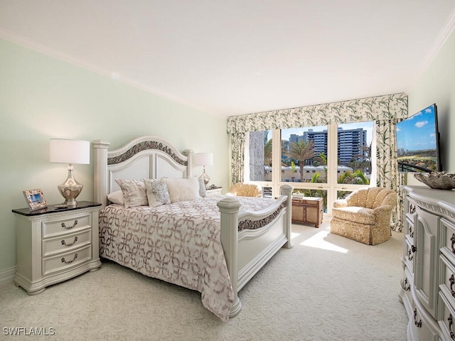 bedroom featuring light colored carpet and ornamental molding