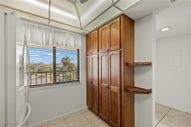 kitchen with light tile patterned floors