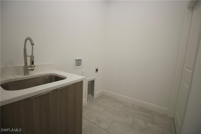 washroom featuring sink, washer hookup, and hookup for an electric dryer