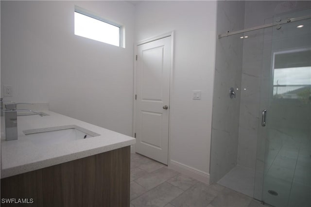 bathroom featuring vanity and walk in shower