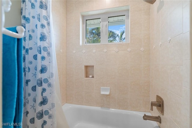 bathroom featuring shower / bath combination with curtain