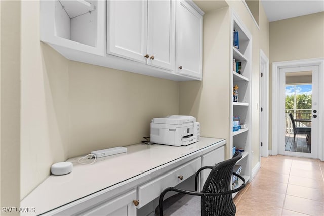 tiled home office featuring built in desk