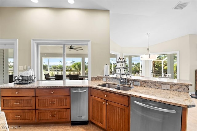 kitchen with light stone countertops, sink, ceiling fan, stainless steel dishwasher, and vaulted ceiling