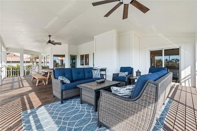 deck with an outdoor hangout area