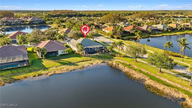 drone / aerial view with a water view