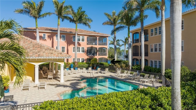 view of pool featuring a patio