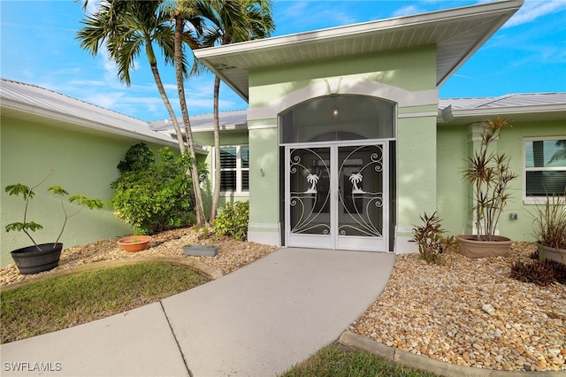 doorway to property with french doors