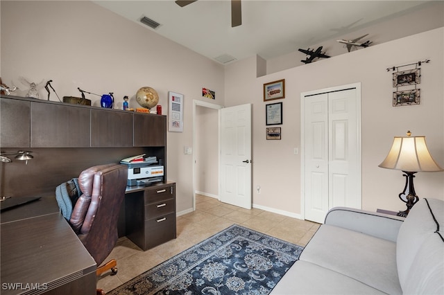 office area with ceiling fan and light tile patterned flooring