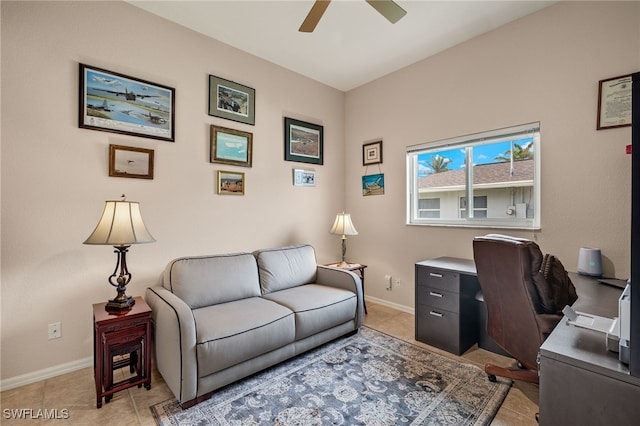 office area with ceiling fan and light tile patterned flooring