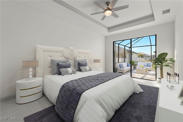 bedroom with carpet flooring, access to exterior, ceiling fan, crown molding, and a tray ceiling