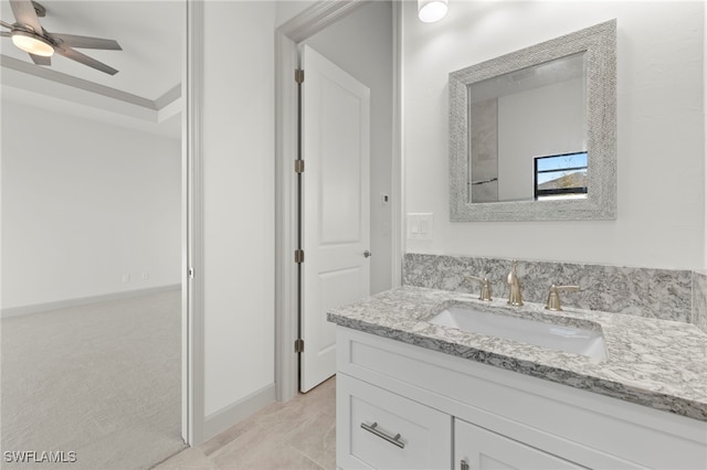 bathroom with ceiling fan and vanity