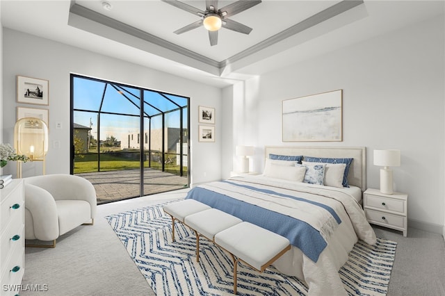 bedroom with access to exterior, ceiling fan, a raised ceiling, light colored carpet, and ornamental molding