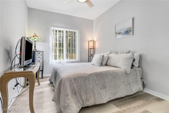 bedroom featuring ceiling fan and light wood-type flooring