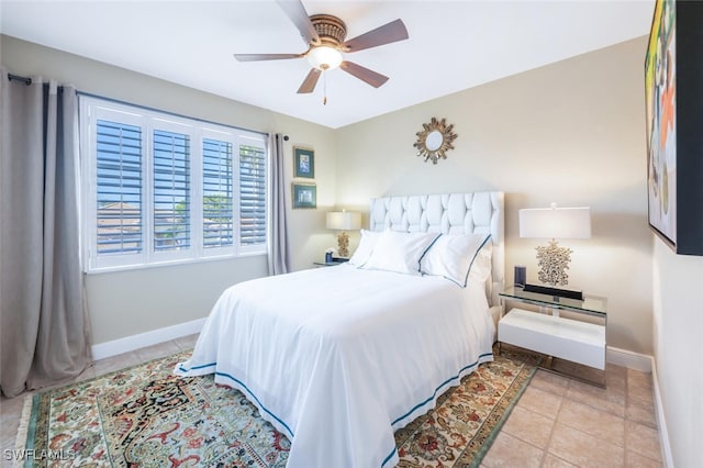 bedroom with light tile patterned floors and ceiling fan