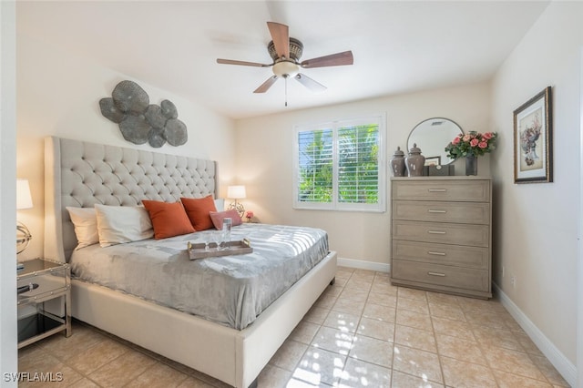 bedroom with light tile patterned floors and ceiling fan