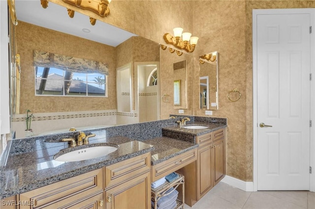 bathroom with tile patterned floors and vanity