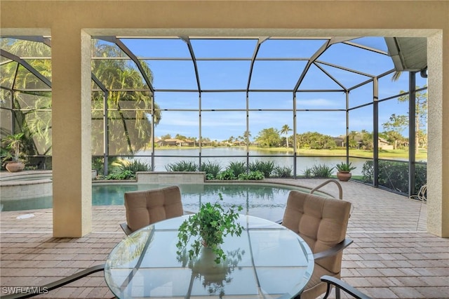 view of patio with a pool with hot tub, a water view, and glass enclosure