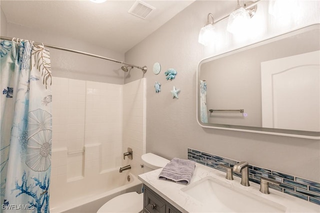 full bathroom featuring decorative backsplash, toilet, shower / bath combo with shower curtain, and vanity