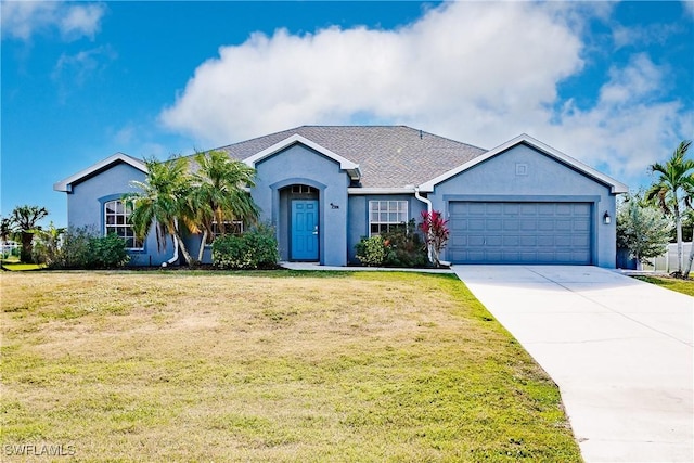 ranch-style house with a garage and a front yard