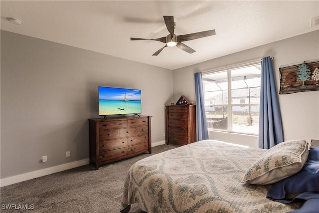 bedroom with ceiling fan and carpet floors